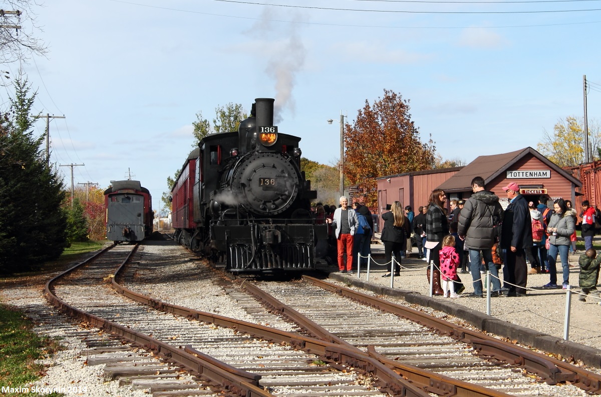 The ex - Canadian Pacific 136, now belonging to the South Simcoe Heritage Railway, sits at the Tottenham station awaiting its next run with 2 1920's era passenger cars in tow. To the left, we have some more railway equipment. For a fun fact, this is the oldest operating heritage railway in Ontario (operating since 1993) and this engine is the oldest operating one in Canada (built in Montreal in 1883).