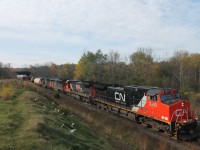 I spotted this train at exactly 14:00. I have been seeing a fair amount of new caterpillar equipment as of late and I am curious as to where it comes from, does anybody know?