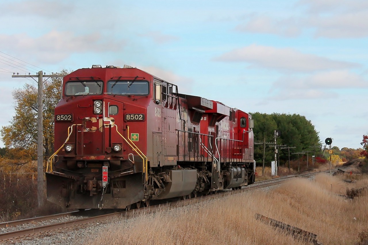 CP 8795 and 9502 race east having been cleared to Guelph Junction. They had been held at Blandford for a west bound autorack to pass.