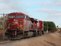 CP 8795 and 8502 race east having been cleared to Guelph Junction. They had been held at Blandford for a west bound autorack to pass.