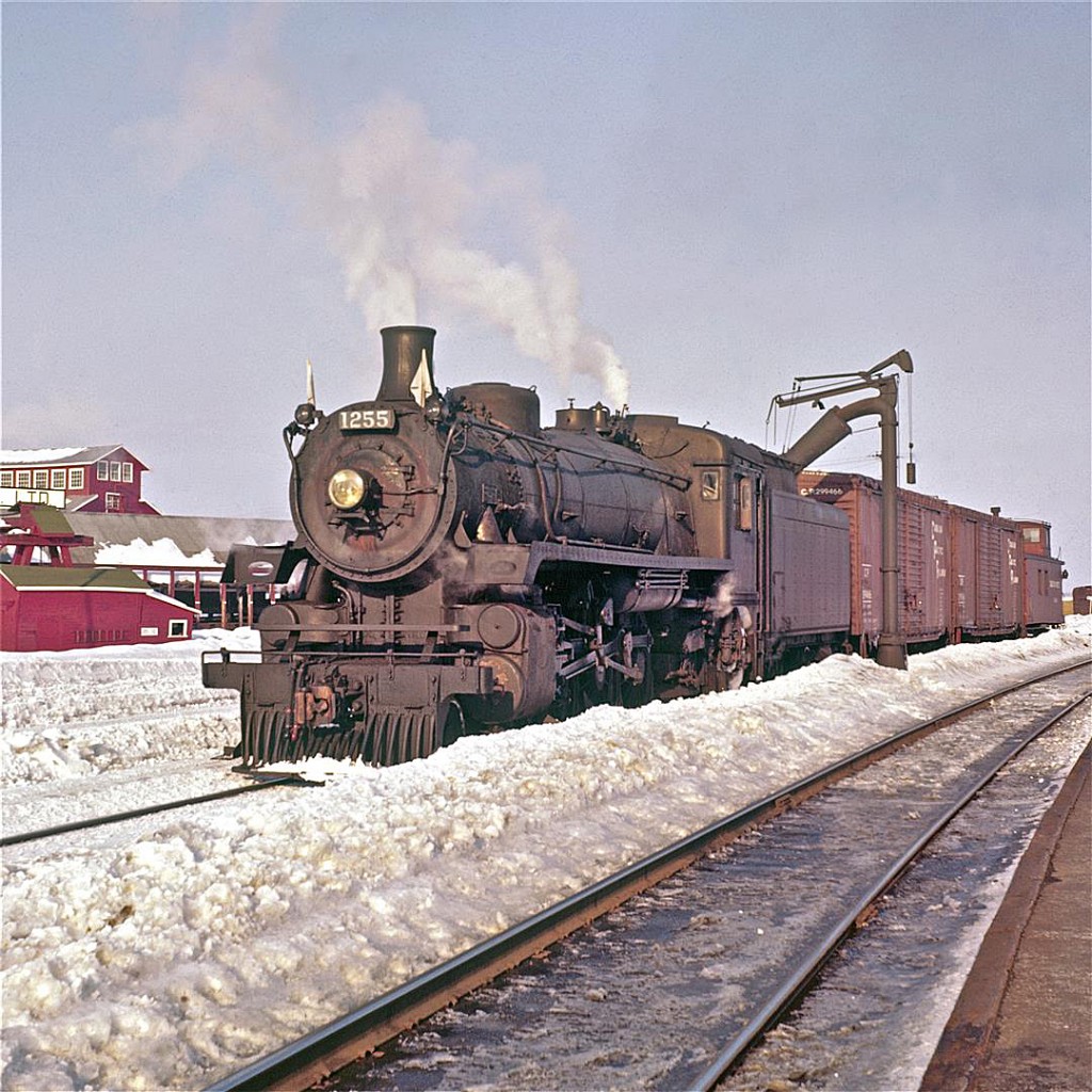 As the snow slowly melts, Pacific-type #1255 prepares to operate a short freight consist.
