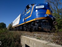 51 years separate this bridge and OSRX 1401 in age - and 57 years have been added to both bringing us to 2014. OSR's daily Woodstock turn is about to see the signal for Carew diamond and, in this case, cherries as VIA 72 has yet to go by.