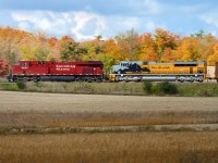 CP 641-061 is wasting no time at track speed between Puslinch and Killean, with clear signals. As I took this shot, T72 (Wolverton to Hagey turn) is taking the main at the west backtrack switch Galt, 641's clear signals will evaporate to restricting, forcing a complete stop at the signal for west switch Killean. 