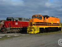 Railtex - meet Genesee & Wyoming. NECR 3840 sits at the Southern Ontario Railway's new Hamilton shop (by Railcare) while 3049 sits beside wearing the emperors new clothes in the form of G&W Orange. 3049, an obviously former CN engine was repainted at LDS in Sarnia from Gulf & Ohio painted, WGCR 9554 (exx YVRR exxx CN of the same number). Photo taken under supervision of, and with permission of the host railway.