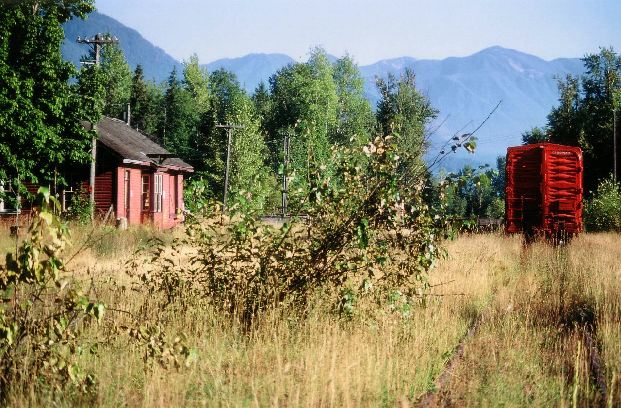 And YOU think YOUR mainline is quiet, Dept: This image would not have seen the light of day here on RP.ca if it were not for Bill Hooper's great shot ( http://www.railpictures.ca/?attachment_id=8335 ) of the "Bery Ferry" ready to "set sail" on Slocan Lake. For this is its' destination. Rosebery, BC. The 1977 CP Timetable lists yard capacity as 4, so we are one quarter of the way by the look of it. And the old station is still in situ !!
Amazing. There once was a remarkable network of isolated branchlines in the BC interior. No more.