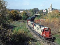 Soo Line SD60 6015 has lead a 398, a grain train, down the grade from Guelph Junction after coming east from London and is stopped in Hamilton for a crew change.