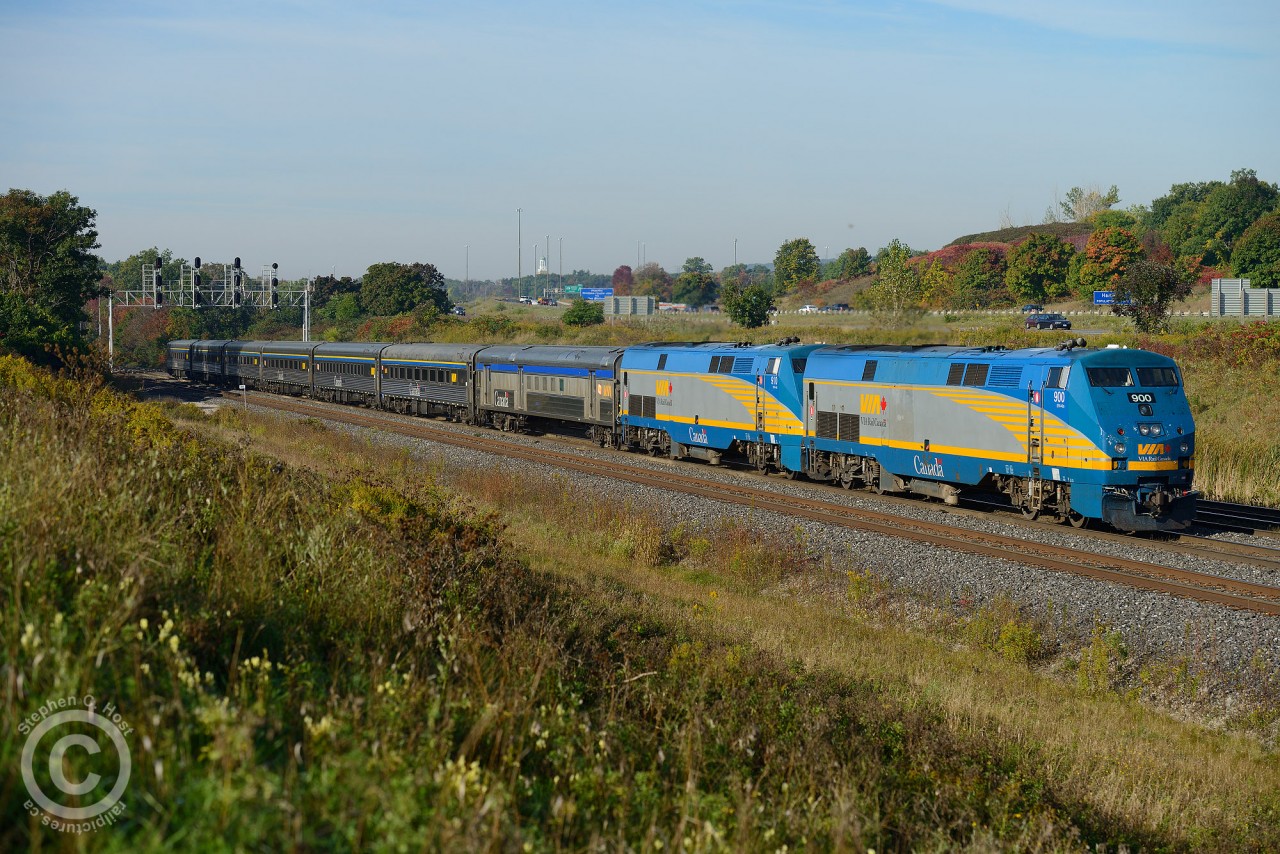 VIA #80 with class unit #900 and 910 is approaching Aldershot station at CN Snake with a consist of stainless-steel budd cars.