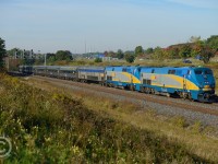 VIA #80 with class unit #900 and 910 is approaching Aldershot station at CN Snake with a consist of stainless-steel budd cars. 