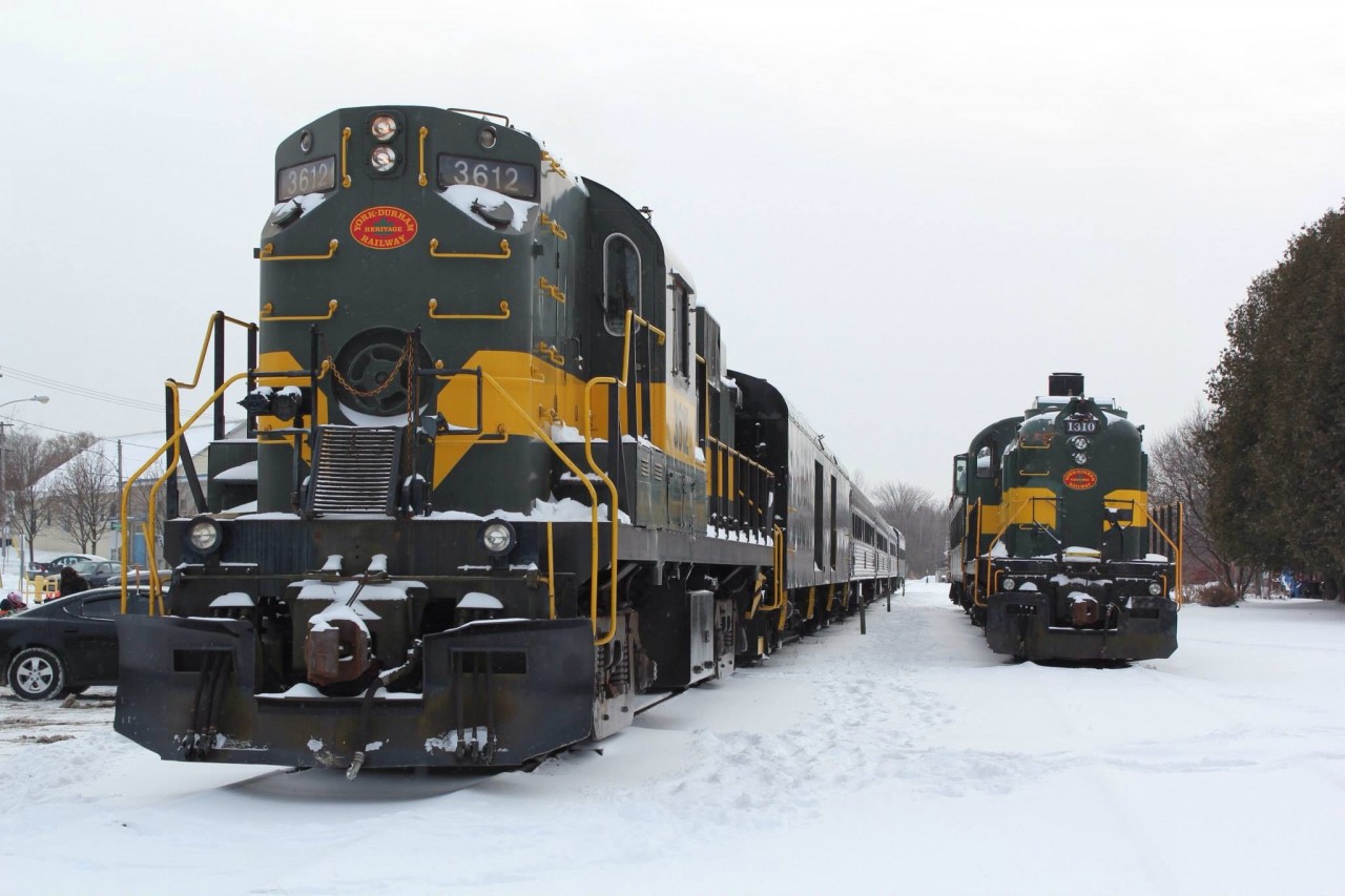 YHDR 3612 sits at the platform preparing for departure as YDHR 1310 sits on the passing track waiting to he winterized.