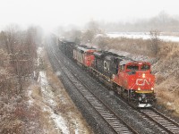 CN 8926, CN 5545 take charge on M308 through Lovekin, Ontario with a decent amount of snow falling.