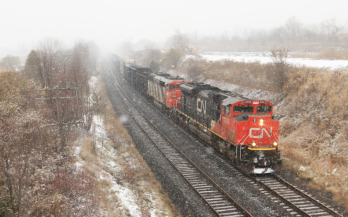 CN 8926, CN 5545 take charge on M308 through Lovekin, Ontario with a decent amount of snow falling.