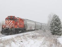 ex CP OSR 8235 takes charge solo with 10 cars in tow. This being the first snow fall that stuck around I just had to to take advantage of it.......who wouldn't ?