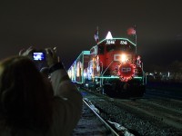 Right before she steps into frame she ask's me can I jump in to take a photo and I reply I don't mind at all. As she snaps a photo of the 2014 CP Holiday train with her iPhone and sure enough it works out perfectly a picture within a picture. Merry Christmas and Happy Holidays!!