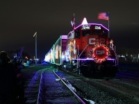 Canadian Pacfic's 2014 Holiday train CP's Canadian Holiday train makes a stop in Lambton yard as the crowd gathers on both ends of the train, some up front to check out what has replaced CP 9815, and the crowd at the middle of the train watching the show! The GP20C-ECO's have replaced the GE's from previous years 2246 will take charge and lead this train across Canada and 2249 will make its way west across Ontario with stops along the way to the US. These two train's brings a lot of joy and christmas spirit to each city they stops in. Merry Christmas and Happy Holidays!!