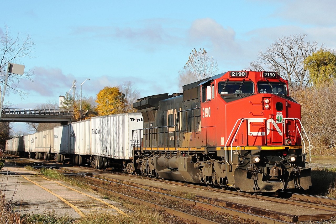 9:15 on a bright cold morning and the eastbound Triple Crown Road/Railer speeds passed the station with CN2190 in charge.
