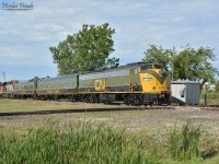 CN 102, TAWAW, CHAMPLAIN, and CN 5279 was running this train through St. Boniface in Winnipeg for the CN Family Days.
