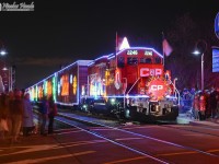 The CP Holiday Train Canadian version makes its first stop at Montreal West, Qc. Lots of people was here. For 2014, the CP Holiday Trains, U.S. version and Canadian version, will have GP20C-ECO leaders.