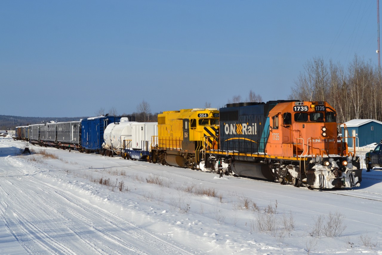 Work train season is over so 1735 and special guest Xstrata 054 leave Englehart for Northbay with Gang 92
054 is due for a traction motor change by ONR.