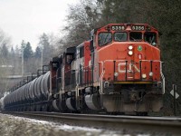 CN locomotive 5356 hauling a load of tank cars west towards Douglas Road in Burnaby.