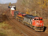 382 rounding the "s" curve at John Ave in Paris, ON with CN 5538 - KCSM 4669 - NS 9375 and 92 cars