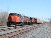 Classic power is in charge of a westbound extra at Aldershot to bring 52 empty autoracks to Beachville, ON for OSR to deliver to CAMI at Ingersoll.