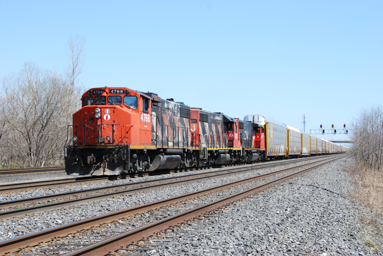 Classic power is in charge of a westbound extra at Aldershot to bring 52 empty autoracks to Beachville, ON for OSR to deliver to CAMI at Ingersoll.