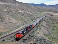 CN 2502 is the lead unit on this westbound load of grain as it approaches the tunnel @Kissick on the Ashcroft sub.