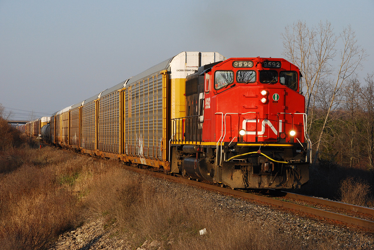 Sweating the assets, old dog CN 9592 has an impressive 70 car L531 underway out of Port Robinson with mostly autoracks for NS at Fort Erie and autoparts and mixed freight for the B&P at Lackawanna, NY.