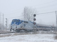 The Maple Leaf stays in Canada this day.  Due to "Snowmageddon" having dumped 6+ feet of snow on the Buffalo, NY area over the past 2 days, rail service (and everything else) has ground to a near halt.  Amtrak has suspended all service between Albany, Cleveland, and Toronto.  Unable to enter New York, here we see VIA 97's equipment in the process of wying at Clifton, operating on the freight-only Stamford Sub in the process.  It will then back into the station to await departure as VIA 98 in the evening.  I'm surprised they didn't just bustitute.  A few years ago this move was a daily occurance for VIA 95 (to become the next days number 90 (or 92 on Sunday)), but now the usually through Amtrak connections are the only VIA service.