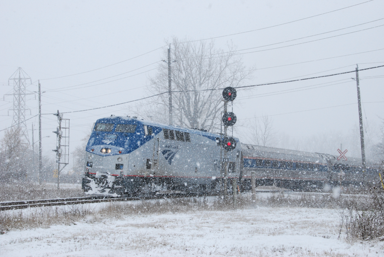 The Maple Leaf stays in Canada this day.  Due to "Snowmageddon" having dumped 6+ feet of snow on the Buffalo, NY area over the past 2 days, rail service (and everything else) has ground to a near halt.  Amtrak has suspended all service between Albany, Cleveland, and Toronto.  Unable to enter New York, here we see VIA 97's equipment in the process of wying at Clifton, operating on the freight-only Stamford Sub in the process.  It will then back into the station to await departure as VIA 98 in the evening.  I'm surprised they didn't just bustitute.  A few years ago this move was a daily occurance for VIA 95 (to become the next days number 90 (or 92 on Sunday)), but now the usually through Amtrak connections are the only VIA service.