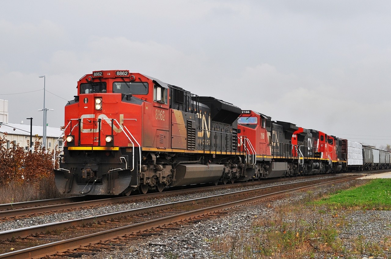 CN 8862, CN 2166, IC 2465 (freshly painted, no longer LMS blue) and CN 4761 pass Georgetown station.