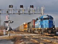 7369,3054, and 3393 are working hard to get their 108 auto racks, empty centre beams, and hoppers up the grade east of the Credit River.