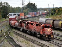 Prior to the recession in 2008/09, CP hosted more trains along its "north route" through Canada. Here is a train was one of the first to hit the chopping block, Winnipeg to Toronto manifest 222. It was distinguished by the block of intermodal traffic on its head end with a mix of manifest traffic spread throughout the rest of the train. Seen here running through the yard in Westfort due to congestion ahead on the mains. It also was prone to hosting CP's aging GMD fleet. This days addition had SD40-2's CP 6040-CP 6022-CP 5952.