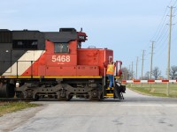 CN train 332 slows down at the Blackwell crossing to pick up the conductor.