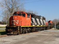 CN4777 with slug 222 and CN7245 cross Harbour Road on their way to the Cargill Elevator.
