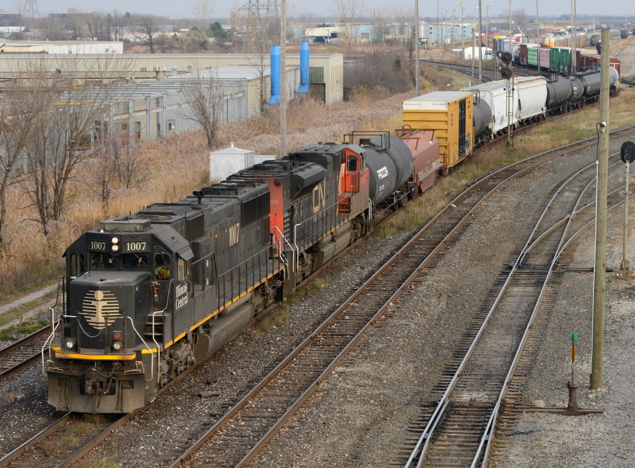 Train 501 leaves Sarnia with IC1007 and CN8908 west bound at Indian Road.
