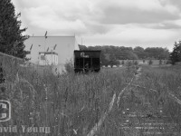 On a forgotten spur on the (north)western edge of Orangeville lies CP 360847. An old CP ballast dump, not likely to see use anytime soon (although there was a load of ballast in it...).<br><br>The picture speaks abandonment to me, grass grows tall between the rails and shrubs and trees are starting to grow on the final stretch of the spur in the background. The switch appears to have been spiked towards where this car sits as the target has been removed. I wonder what has happened in the time between posting this (Nov 2014) and since taking the shot...