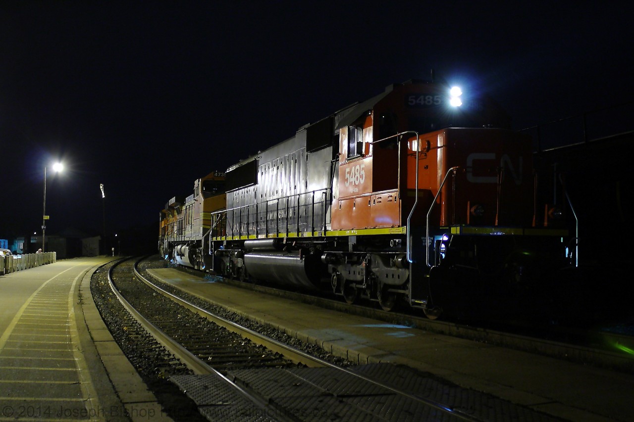 After completing their work at Brantford, CN 396 begins to build their air up before departing Brantford on a mild November evening.  Their power tonight consisted of CN 5485, BNSF 4735, BNSF 7840.