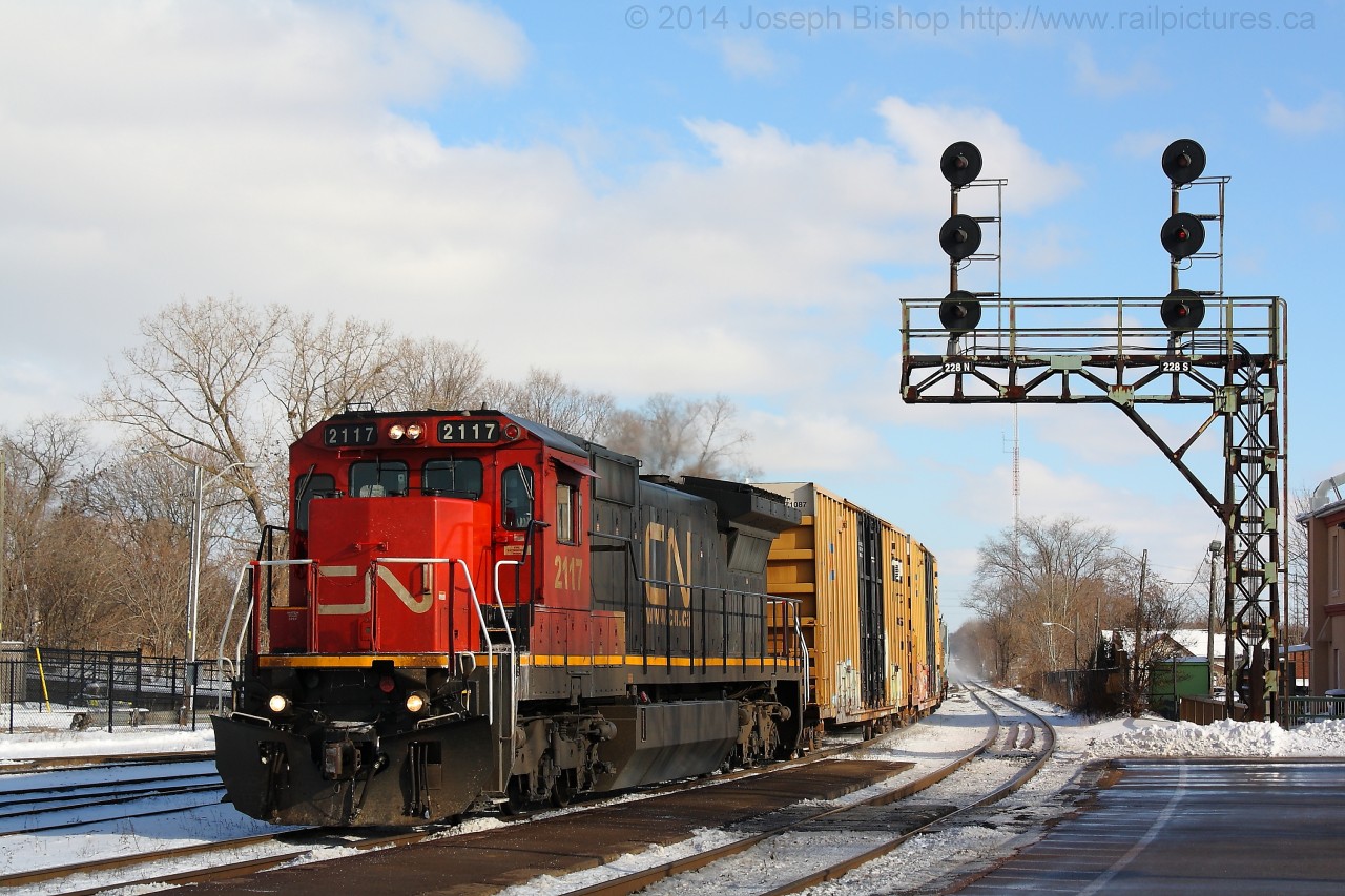 CN 2117 leads train 331 under the signals at Brantford on a nice November afternoon.
