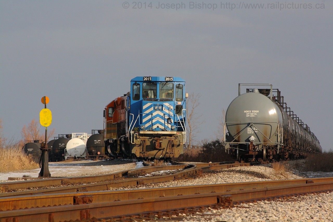 End of an Era This morning dad and I went out to Jarvis to run a few errands and swung by the SOR yard in Garnet to see what there was to shoot.  The power for the Nanticoke Road Switcher was parked back in the yard with CEFX 2015, RLK 3873 and QGRY 2301.  The GP20D's time on the SOR is a few weeks from being finished, with RLHH 3403 and RLHH 3404 on site in Hamilton being prepared to move up to Garnet and take over the road freight duties on 597.  I will be sad to see the GP20D's go, but I am looking forward to some new variety on the SOR!