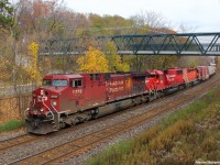 A CP WB headed for the MacTier Subdivision (Likely CP 421 or CP 301) is wasting no time getting by, and is seen unexpectedly passing Rosedale in this photograph. The consist was CP 9750, CP 6221 and CP 5919, adding some taste to the usual boring GE's. However, I'd like that leader swapped outa' there! 