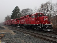 Here are 2 signs of winter, snow falling, and of course, the Canadian Pacific Holiday Train. As I woke up this morning, I got a a timely notification that both Holiday Train consists (The U.S and Canadian) were running together to Montreal, where they'll split and go their directions at the end of the month. I thought it'd be pretty cool, and as I got a notification that they passed Palgrave, Ontario I immediately headed out to the tracks with about 10 minutes to spare to set up my camera. My zoomed in shot didn't turn out as good as the camera focused on the snow instead of the train, but thankfully I grabbed this shot which came out fine before the train passed. See www.cpr.ca for the schedule of the Holiday Train. The train stops in major cities and towns, with the Christmas lights on, and viewers can watch for free, however are encouraged to donate a non-perishable food item for a local food bank. There will also be a performance at every stop.