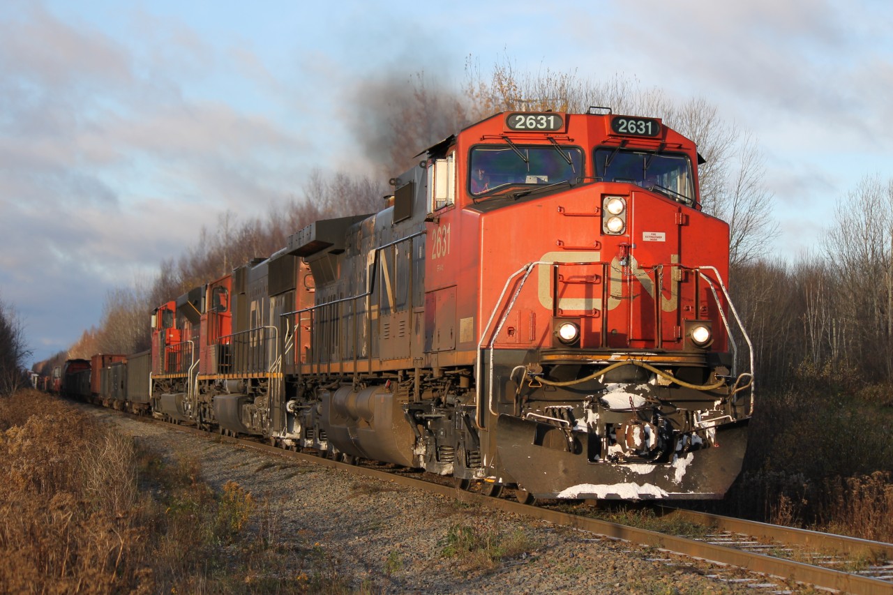 A late CN 120 heads out of Moncton for HIT and the yard at Halifax, NS.