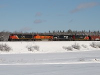 More and more crude trains are coming to the Maritime provinces for unloading at the Irving refinery in Saint John NB.  Today shows a colourful U700 on the Sussex Sub with CN 2611, BNSF 749, NS 9812 and CN 2454 in an all GE consist. 