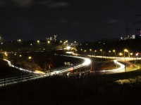 The 1940 departure from Union takes a run at the Don Valley as it rounds the 35mph S curve by Pottery Road. Meanwhile, Toronto's insanity takes place around it.