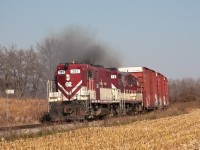 Ontario Southland 383 & 378 throttle up for the trip to St. Thomas. Rather long train today for St. Thomas, I never counted but it was well over a dozen cars. Passing my family home @ Mile 11 during my trip home this week. 