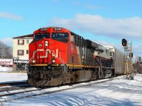 Having seen 393 pass by me at Woodstock in a train generated blizzard I glimpsed that the second unit was a NS Heritage. Having not seen one of these units before, I drove down to Ingersoll station and waited for two hours for 393 to finish switching. The wait was more than worthwhile as 2338 led NS 8101 at a steady pace.