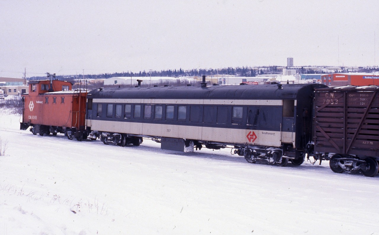 Terra Transport coach 757 brings up the rear of Mixed Extra 941 West departing Grand Falls for Corner Brook during Christmas week 1987. Due to a CTC order, this service would be suspended a few days later until April of 1988. Originally built in 1943 as coach No. 40 for the Newfoundland Railway by the CC&F it was assigned to the Bishops Falls - Corner Brook run from 1984 to 1988 after the mixed runs on the branchlines were cancelled. Coach 757 and her some of her sisters can be seen in active branchline duty in my latest book, RAILS AROUND THE ROCK - A Then & Now Celebration of the Newfoundland Branchlines by Kenneth G. Pieroway, released by Creative Book Publishing, September 2014.