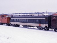 Terra Transport coach 757 brings up the rear of Mixed Extra 941 West departing Grand Falls for Corner Brook during Christmas week 1987. Due to a CTC order, this service would be suspended a few days later until April of 1988. Originally built in 1943 as coach No. 40 for the Newfoundland Railway by the CC&F it was assigned to the Bishops Falls - Corner Brook run from 1984 to 1988 after the mixed runs on the branchlines were cancelled. Coach 757 and her some of her sisters can be seen in active branchline duty in my latest book, RAILS AROUND THE ROCK - A Then & Now Celebration of the Newfoundland Branchlines by Kenneth G. Pieroway, released by Creative Book Publishing, September 2014.