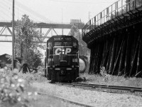 Canadian Pacific Locomotive running alongside the old wooden trstle in New Westminster making its way toward Brunette Slough